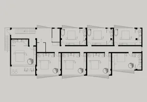 Floor plan of a modern apartment layout with multiple rooms and bathrooms.