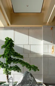 Minimalist room featuring polished concrete tiles