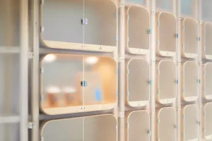 Modern, glass-front storage cabinets in an interior setting