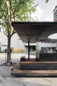 Modern restaurant exterior with steel and glass structure