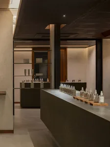 A modern spa interior with concrete walls and a minimalist design.