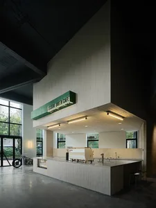Contemporary cafe featuring modern materials and LED lighting.