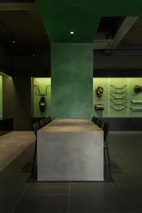 Industrial-style restaurant interior with concrete and metal elements