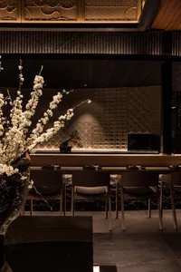 Modern restaurant interior with dark space, contemporary design, and contemporary furniture.