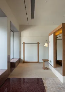 Minimalist interior space with wooden walls and terrazzo floor tiles