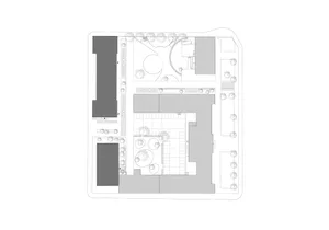 Black and white architectural floor plan of a multi-room structure on a white background.
