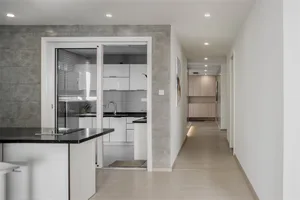Modern kitchen with concrete walls and minimalist design