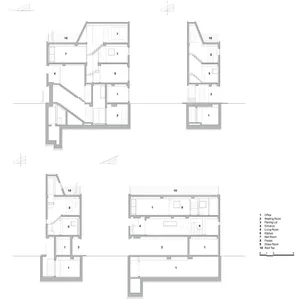 A detailed architectural floor plan of a modern residential townhouse, showcasing the ground floor layout.