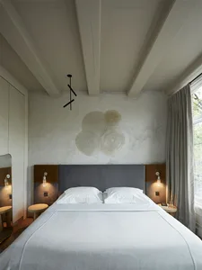 Minimalist bedroom with neutral colors and simple furniture