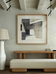 Modern minimalist living room with concrete walls and furniture.