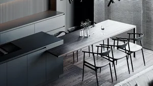 A minimalist residential kitchen features a long wooden table and black chairs.
