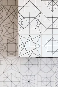 Geometric patterns on white tiles