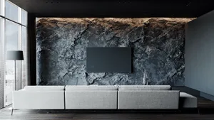 Modern living room with stone accent wall and minimalist decor