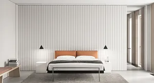 Modern minimalist bedroom with metal frame bed, white headboard, and wooden bench, overall clean and simple design.