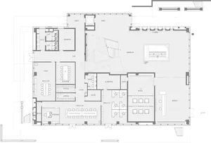 Floor plan showing the layout of a modern office space with various functional zones.