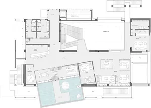 Modern architectural floor plan of a building showing various rooms and spaces.