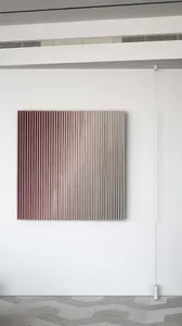 A minimalist abstract panel made of wood.
