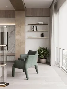 Minimalist residential living area featuring wooden flooring, marble walls, green armchairs, floating shelves, and potted pla