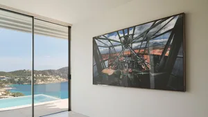 Modern interior with large glass windows and metallic accents.