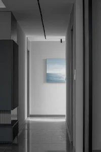 Modern corridor with concrete flooring and minimalist design