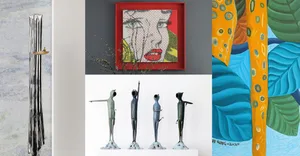 A modern interior decor setting featuring metal sculptures and glass artwork.