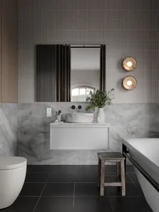 Modern bathroom with marble features and minimalist design.