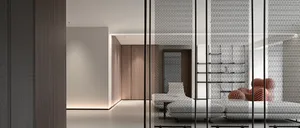 A modern living room featuring a metal partition screen, contemporary furniture, and minimalist design elements.