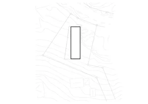 A black and white architectural plan showing a rectangular plot on a detailed map.