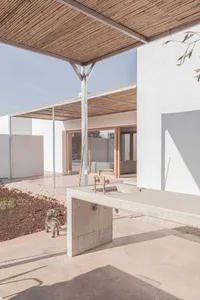 Modern exterior residential architecture featuring minimalist design, concrete, and wood.