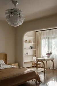 Modern bedroom featuring wooden furniture, white curtains, and a large window allowing natural light to enter.