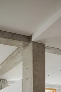 Modern interior space featuring a sturdy concrete support column