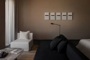 Minimalist residential interior with neutral tones and modern furniture and decor.