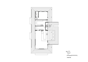 Two-story house plan with various rooms and spaces, including a kitchen, living area, and bedroom, represented by lines, shapes, and text labels