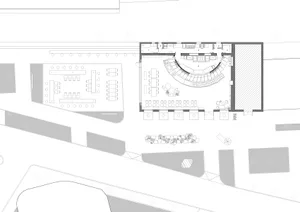 2D floor plan of a modern building interior with dining and living areas, featuring linework, labels, and symbols