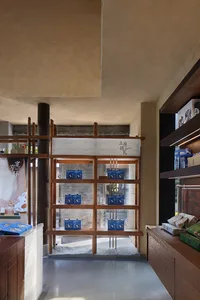 A modern store with wooden shelves, displaying various products in a well-organized and visually appealing environment
