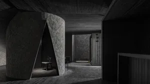 Dark hallway with a stone wall, wooden door, and two chairs, a potted plant adds greenery to the space
