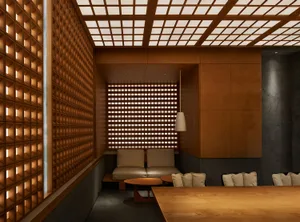 Cozy restaurant interior with wooden walls, metal accents, and a dining table surrounded by chairs in a dimly lit space