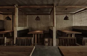 Warm and inviting restaurant interior with wooden walls, tables, and benches, creating a cozy atmosphere for patrons