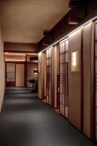 Elegant hotel hallway with wooden walls, black tile floor, and modern decor