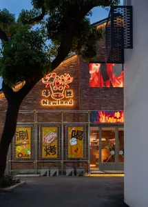 Modern Asian restaurant with a brick exterior, comfortable seating, and stylish decor