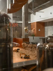 Construction site with metal containers, industrial setting, and renovation work in progress