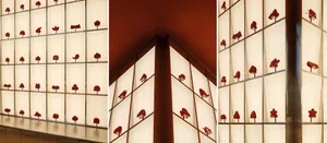 A creative arrangement of red shoes on a wall, showcasing unique design elements and decorative use of footwear