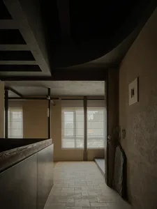 Empty living area with a tile floor, brown walls, and natural light from two windows