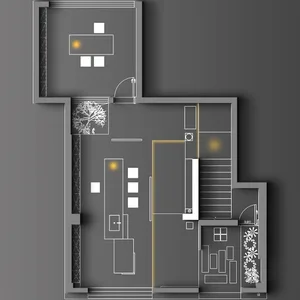 Dimly lit modern living space with white walls, clean lines, and minimalistic elements