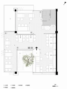 A cozy living room with a tree inside, featuring comfortable furniture and a well-planned layout