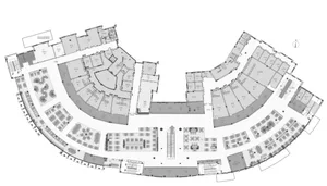 A modern auditorium with multiple rows of chairs and a functional design for various events and gatherings