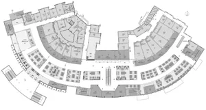 A modern event space with rows of chairs, a functional design, and ample seating options