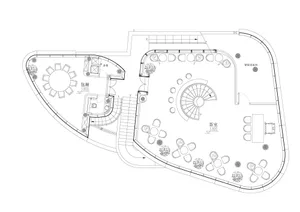 2D floor plan with various rooms and spaces, featuring a mix of architectural styles and well-lit areas