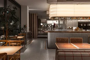 A restaurant interior with a bar area and tables, featuring bottles and comfortable seating for socializing and dining