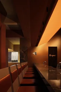 A luxurious dining space with a marble table and comfortable seating for guests, surrounded by sophisticated decor